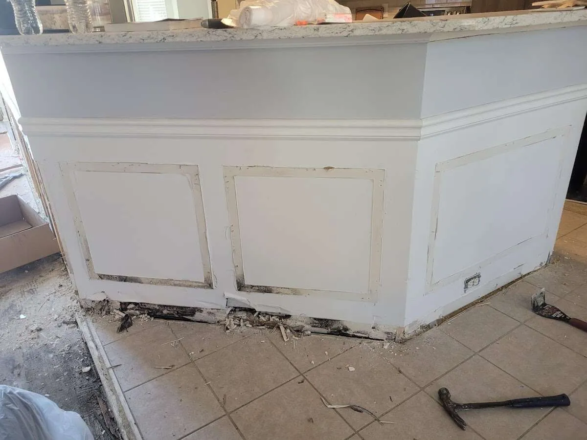 Water damage and mold on kitchen during Storm Damage Restoration in Makakilo